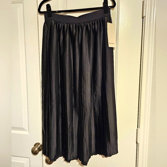 lululemon athletica Dresses & Skirts - NWT Lululemon Pleated Black Satin Midi Skirt